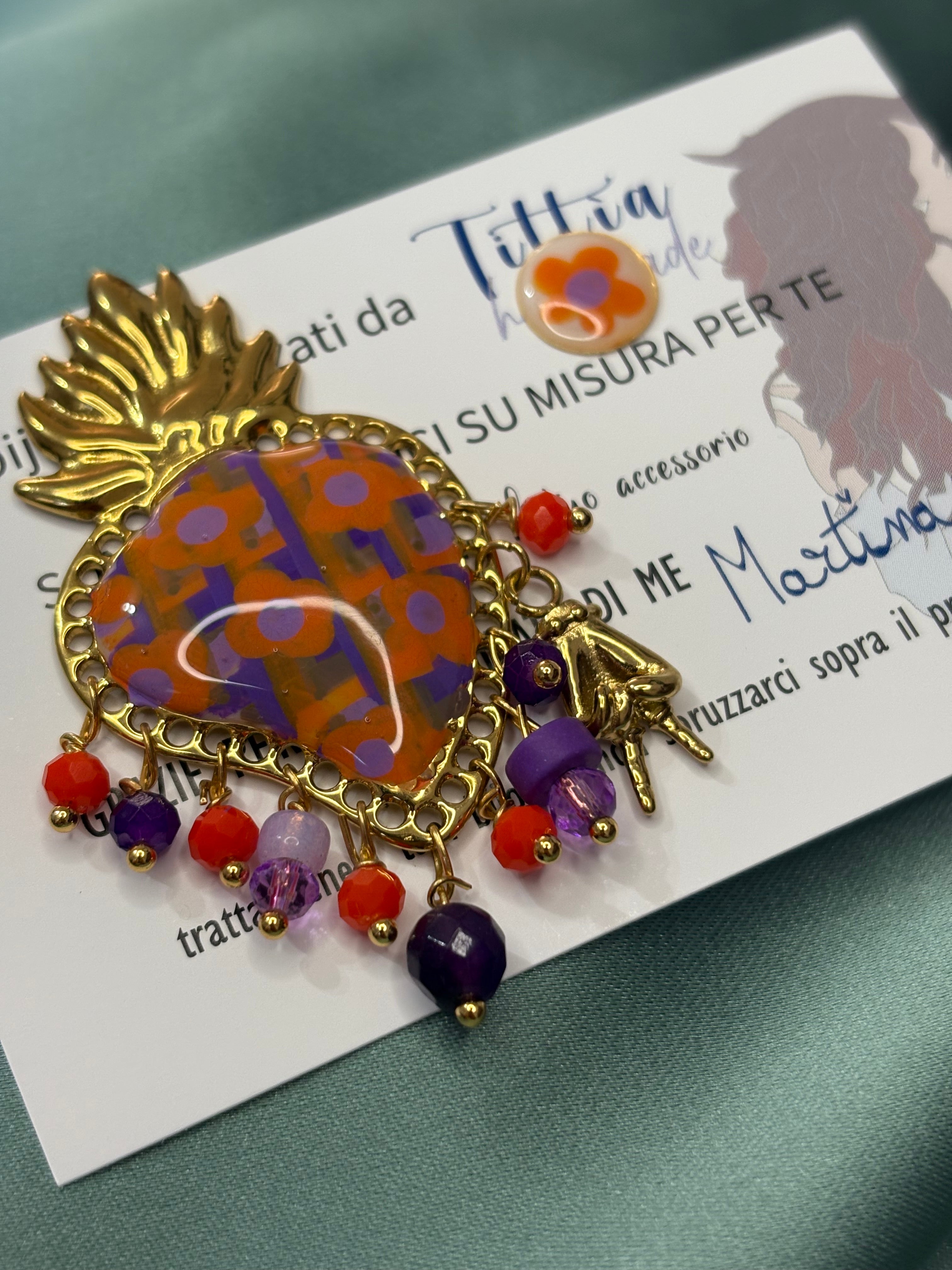 Cuore sacro fiori arancio