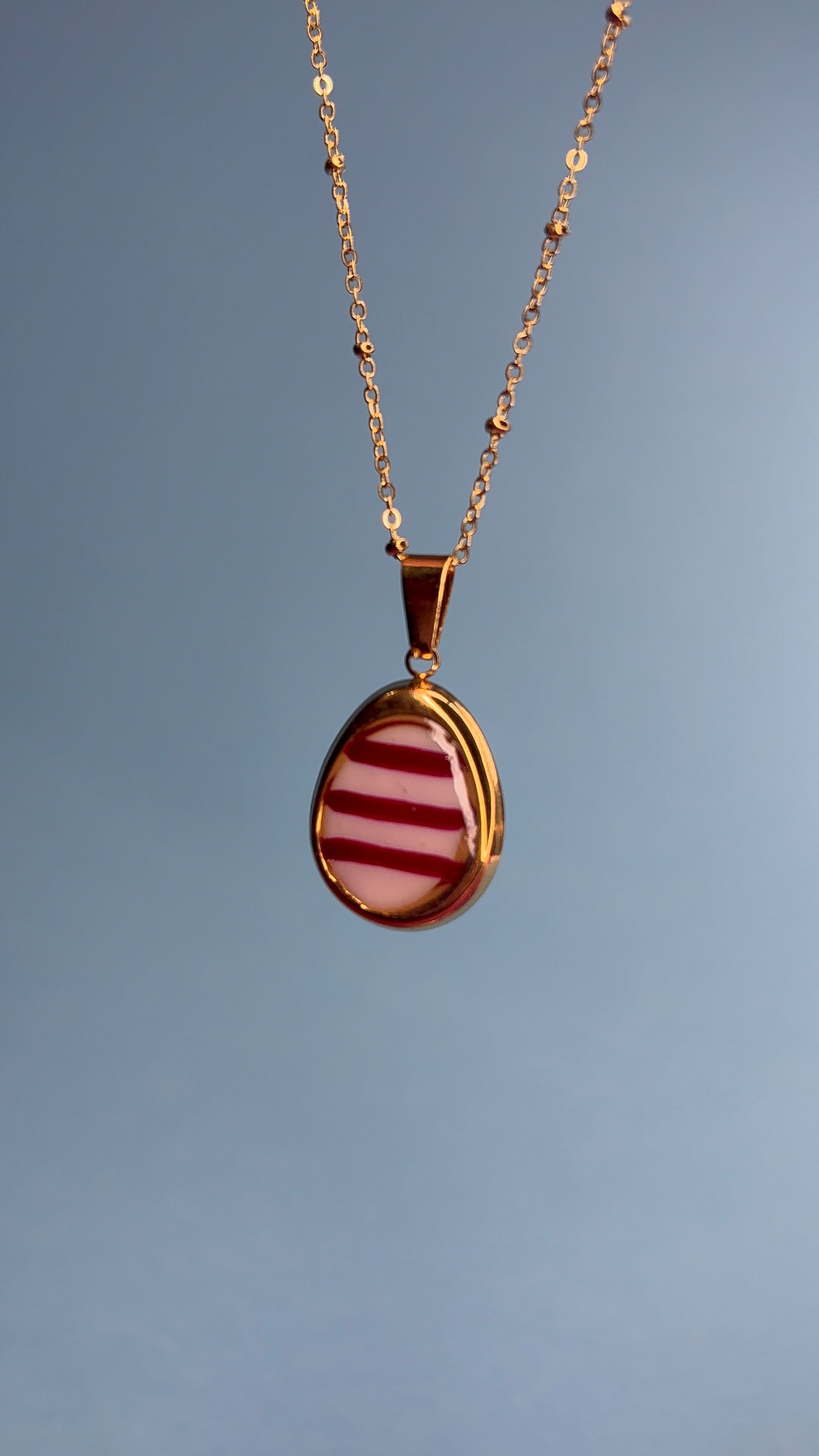 Medaglietta rosa bordeaux