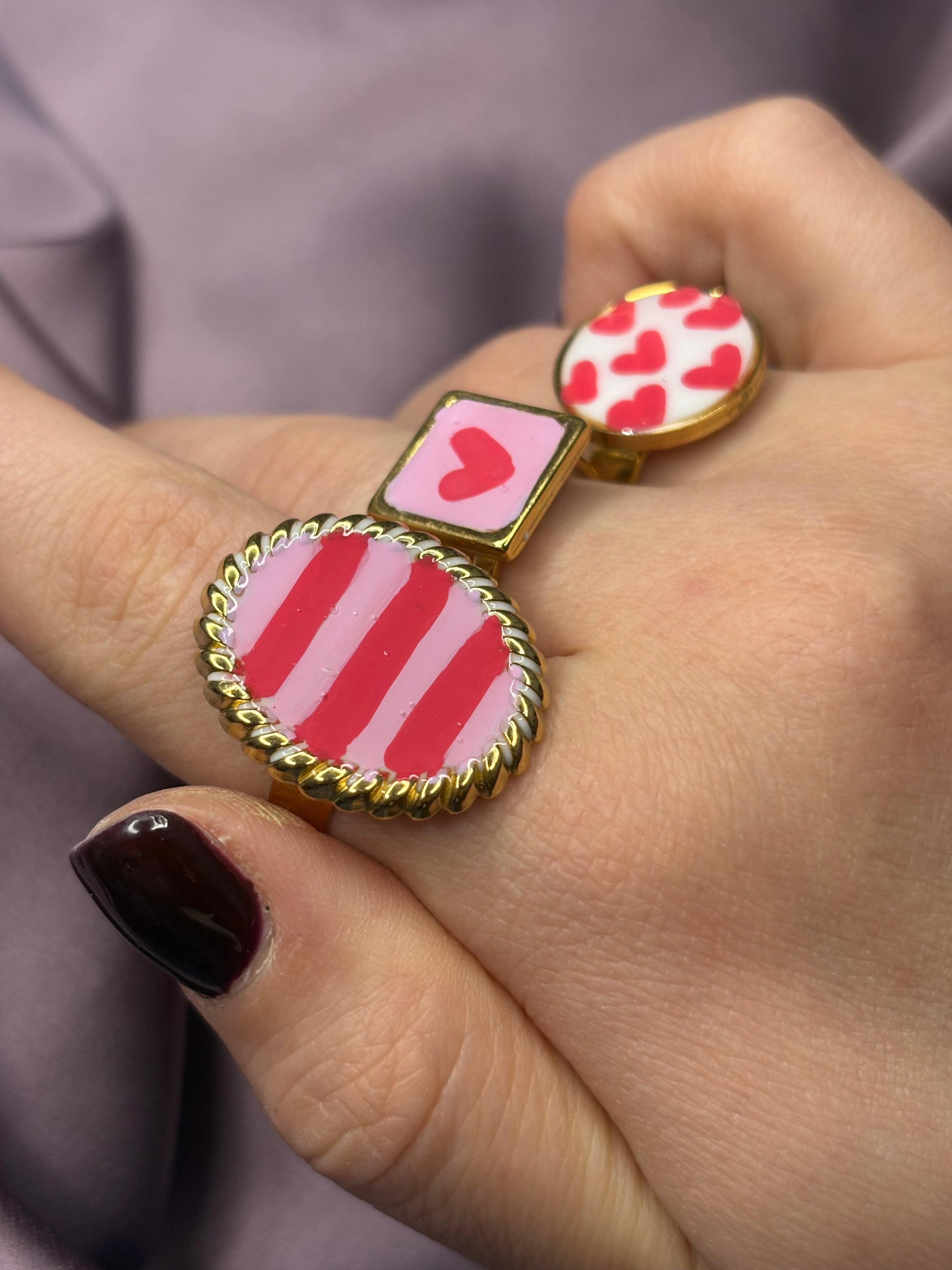 Anello medaglia rosa•rosso