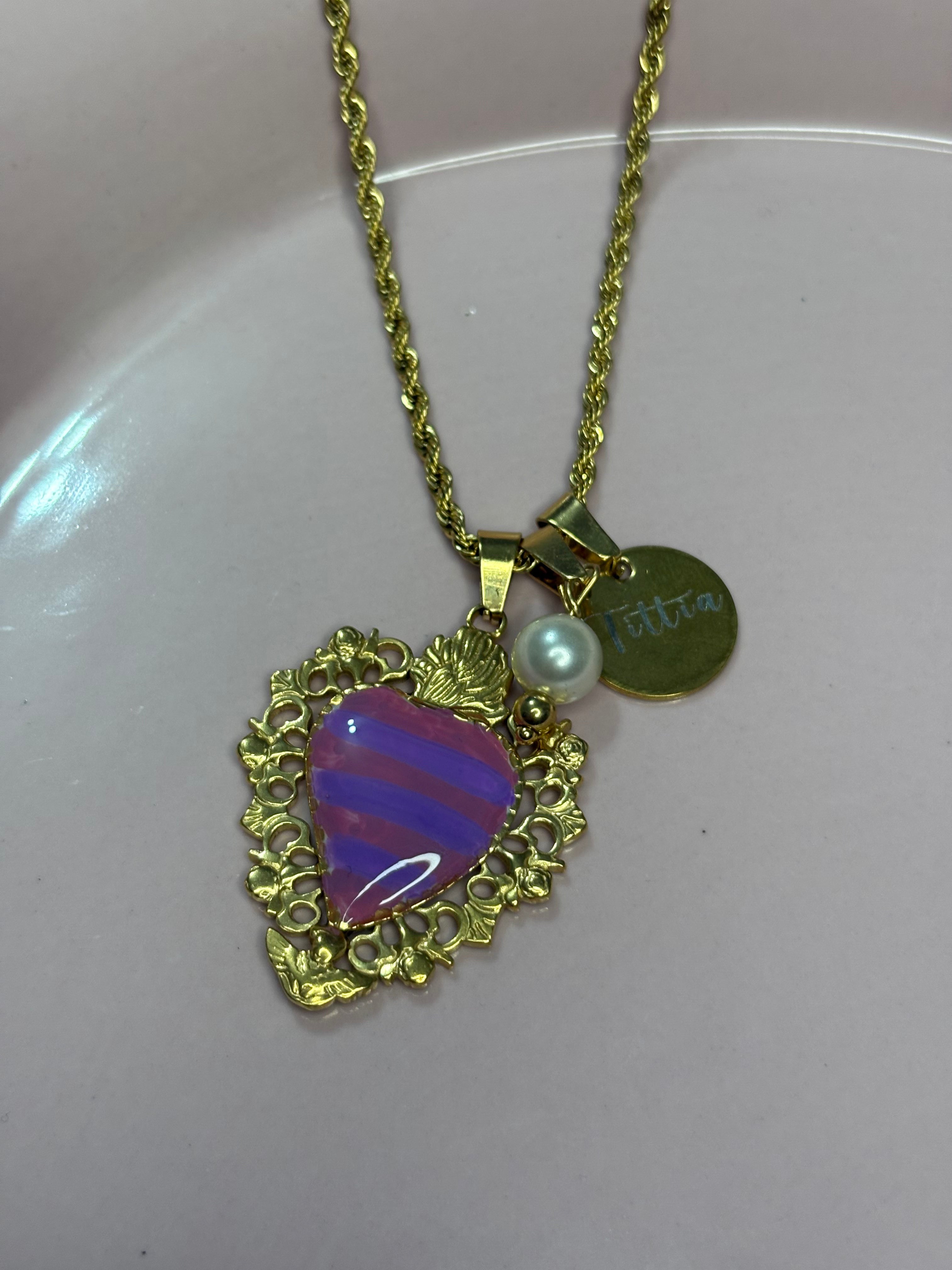 Cuore sacro lilla rosa