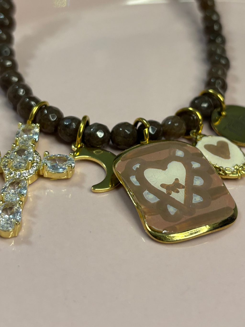 STOLEN multicharm marrone