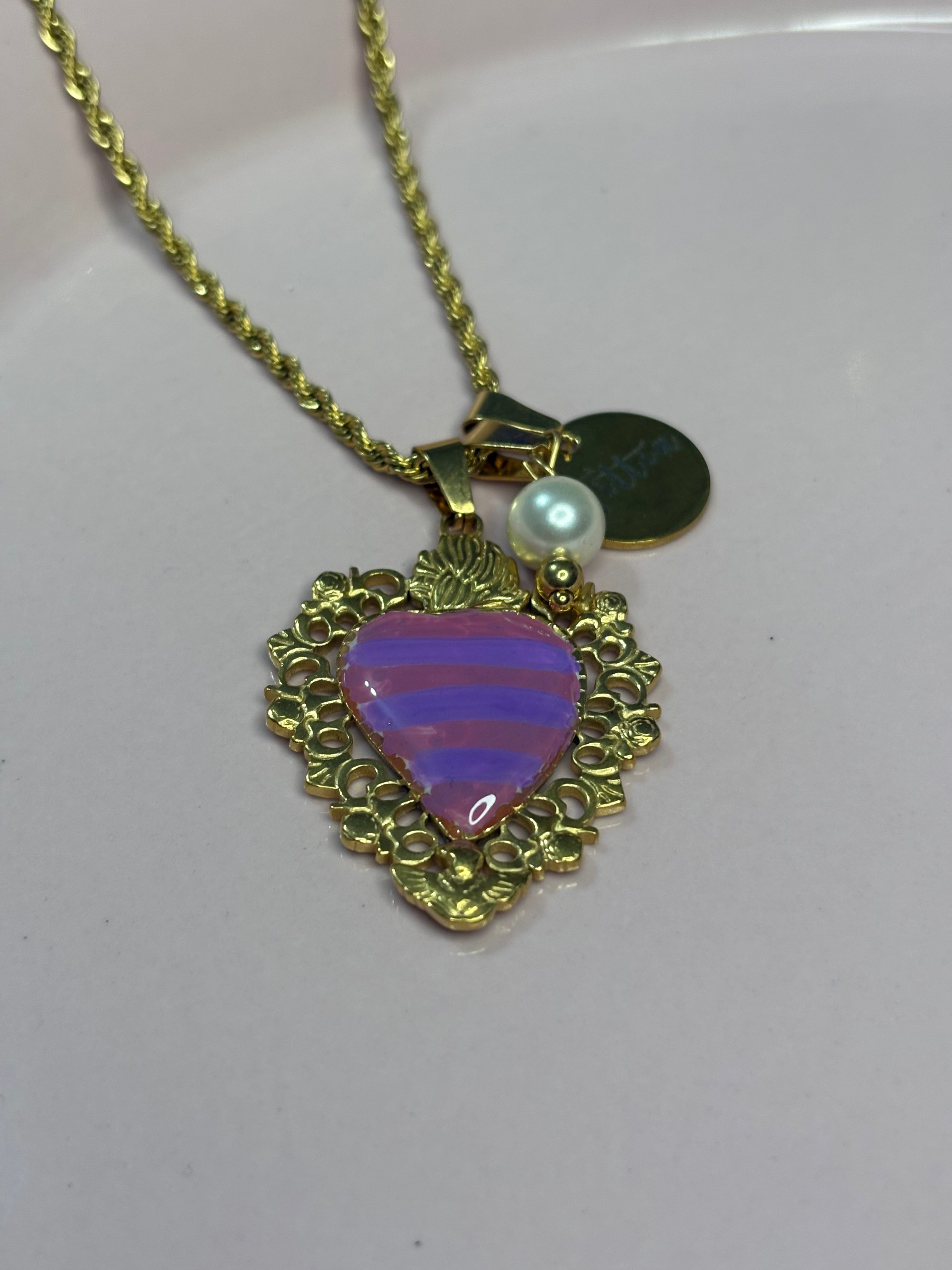 Cuore sacro lilla rosa