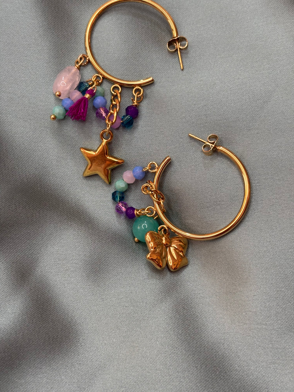 Cerchio multicharm acqua e viola