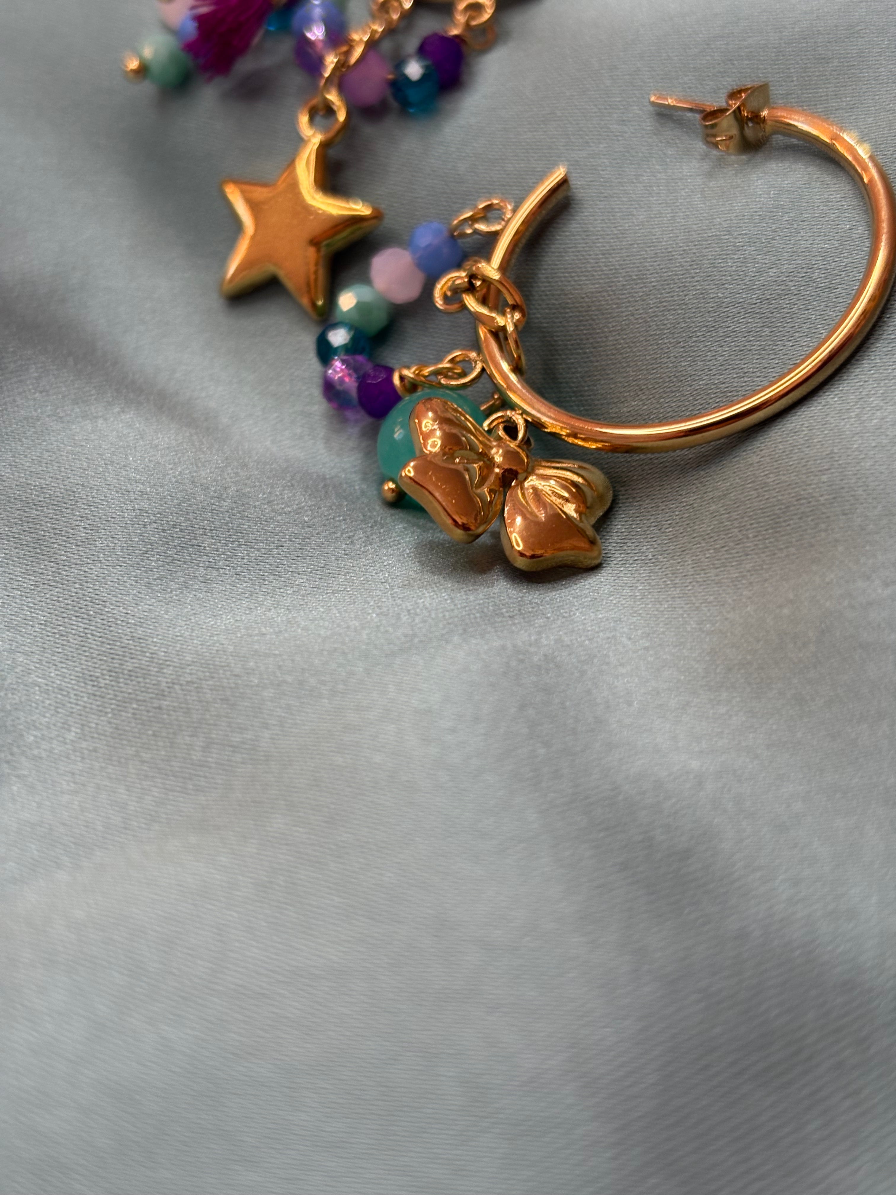 Cerchio multicharm acqua e viola